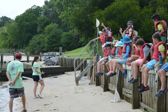 Anna Caputo teaching on the beach