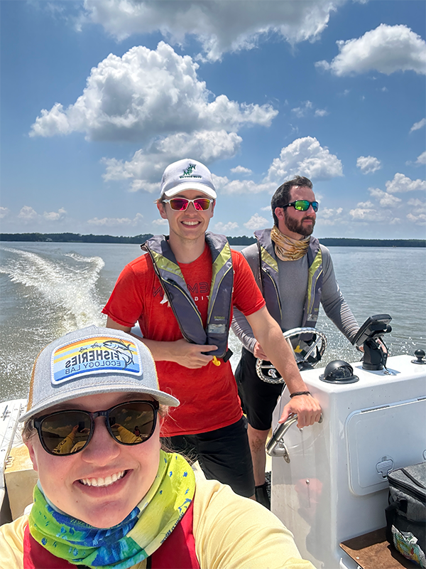 Technicians Anna DeMotte and Joseph (Brody) Phillips and Scientist Jack Buchanan at work during the 2023 Juvenile Striped Bass Seine Survey. Photo courtesy of VIMS Staff.