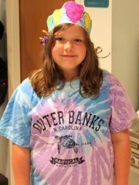 Skyler Chorba of Williamsburg shows off her colorful oyster crown during Marine Science Day. Photo by Erin Kelly.